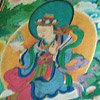 Magnificent paintings on the wall depicting Tibetan dieties